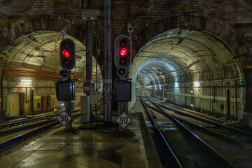 Lisbon, Portugal. 7 December 2023. From Rossio train station into an illuminated train tunnel, a...