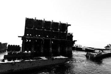 Socotra cormorants on submerged tugboat shipwreck  in the eastern coast of Bahrain sea.