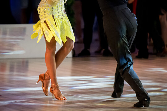 a couple dance a Latin dance. the legs of a dancing couple