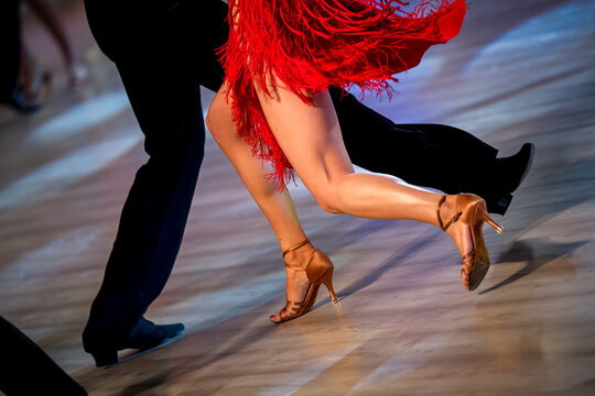 a couple dance a Latin dance. the legs of a dancing couple