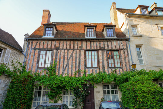 Old timbered brick house in the medieval city center of Senlis in Oise, Picardie, France