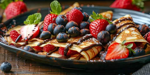 Fotobehang Plate of Pancakes With Strawberries and Blueberries © yganko