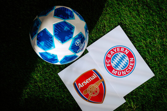 Arsenal F.C. (ENG) vs. Bayern Munich (GER. Quarter Finals of football UEFA Champions League 2024 in Europe. Logo of teams and official soccer ball on green grass