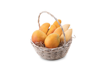 basket with mangoes isolated on white