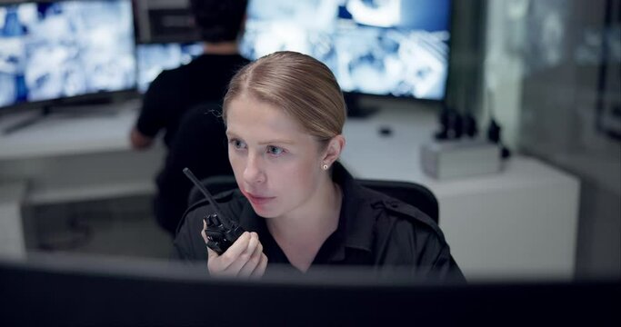 Woman, walkie talkie or talking for security monitor for protection service, cctv or building safety. Face, video surveillance agency or guard speaking in control room with footage or camera at night