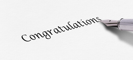 Congratulations message. Fountain pen writing "Congratulations" on paper.