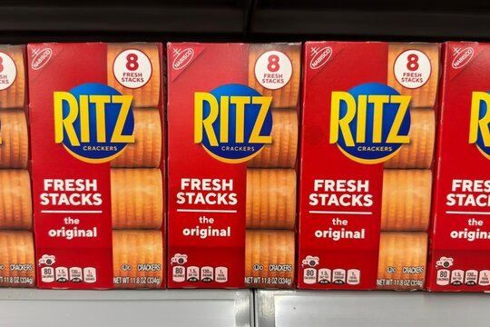 Boxes of Nabisco Ritz Crackers on a store shelf 