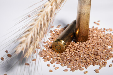 close-up on the case lying on the grain. Concept of war and export of Ukrainian grain
