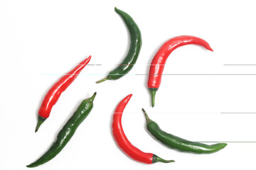 Separated group of red and green hot chili pepper top view isolated on white background clipping path