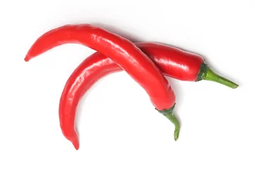 Poster Two red hot chili pepper top view isolated on white background clipping path © dwiangga