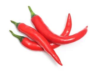 Fotobehang Three red hot chili pepper top view isolated on white background clipping path © dwiangga