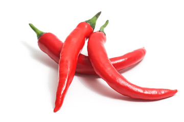 Three red hot chili pepper isolated on white background clipping path
