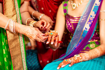 Bridal rings during Indian Haldi wedding ceremony