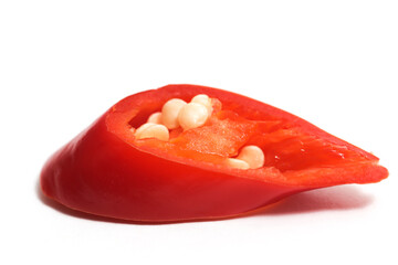 Close-up three sliced red hot chili pepper isolated on white background clipping path