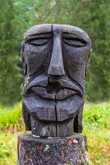 Wooden Carved head on Mount Floyen - 763565258