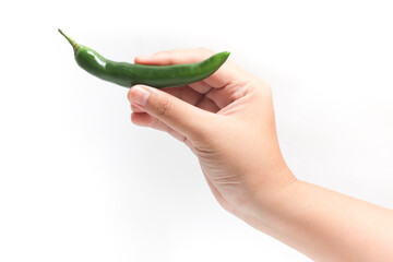 Hand holding green hot chili pepper isolated on white background clipping path