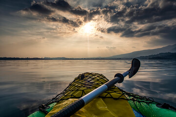 Kayak on Lake Pusiano at sunset - 763569436