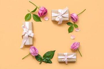 Beautiful frame made of gift boxes and roses on yellow background