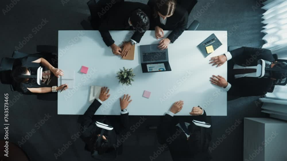 Poster top view of smart business group wearing vr headset while project manager using laptop and phone sen