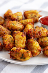 Homemade Fried Tater Tots on a Plate, side view.