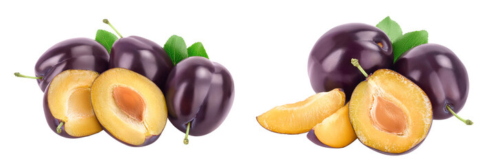 fresh purple plum and half with leaves isolated on white background with full depth of field