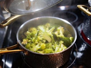 Steaming Broccoli, Cooking Vegetables, Steamed Vegetable in a Pot on a Stove, Nutritous Meal