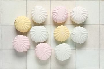 Sweet zefirs on light background, top view