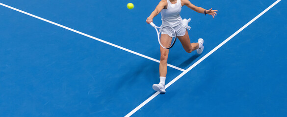 Woman playing tennis on blue floor. Horizontal sport poster, greeting cards, headers, website
