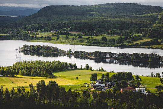 Green fields in front of the river Ljusnan in Hälsingland
