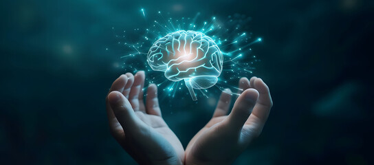 A hand holding a holographic brain represents futuristic thinking and innovation. The bright, glowing brain icon floats above the hand, symbolizing creativity, and mind control. - obrazy, fototapety, plakaty
