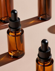 Amber Dropper Bottles Mockups on Beige Background. Essential or Hemp Oil. Promotion of natural cosmetics