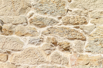 granite stone wall background, natural stone granite wall. Seamless texture.