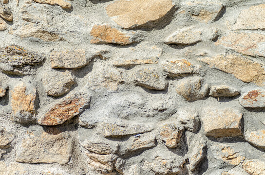 Background of stone wall texture. Close up of stone wall texture. Granite