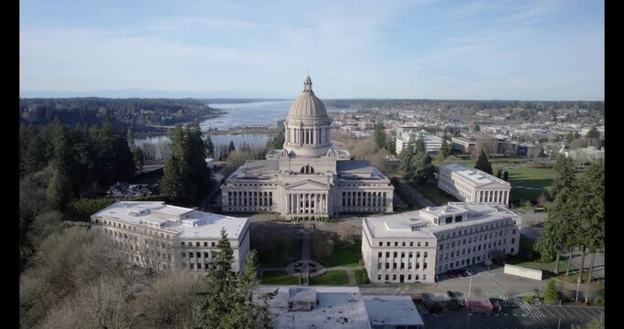 Washington State Capitol in Olympia, Washington, with Capitol Lake, the city of Olympia, and the Puget Sound in the distance.
