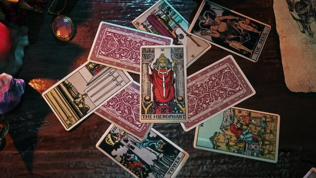 New Delhi, India - June 8, 2017. Spiritual forecasting of the future with the tarot card Hierophant. Spiritual Tarot card forecasting fortune. Card forecasting spiritual enrichment