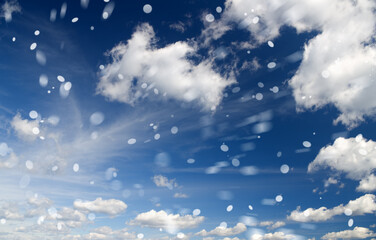snowfall against blue sky background - 763617410