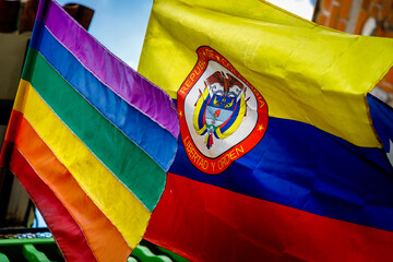 Closeup of Colombian and LGBTIQ flags hanging in Guatape, Colombia