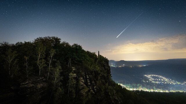 Perseids shooting star above the Lilienstein, Elbe Sandstone Mountains, Saxon Switzerland, Germany, Europe