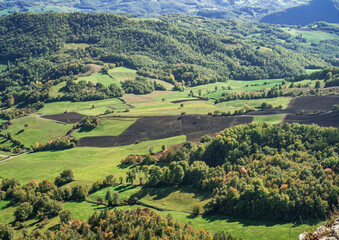 The lands mainly cultivated with fodder in the Parmigiano Reggiano production area. Castelnovo ne' Monti, Reggio Emilia, Emilia-Romagna, Italy.