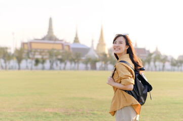 A Traveler Asian woman in her 30s exploring Wat Pra Kaew. From stunning architecture to friendly...