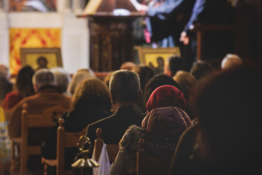 Greek Orthodox Christian Easter ceremony procession, divine worship service, worshippers hold candles, parishioners during an Easter vigil mass in a Cathedral, Athens, Attica, Greece, divine liturgy