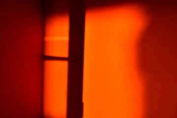 Shadow on Orange Wall