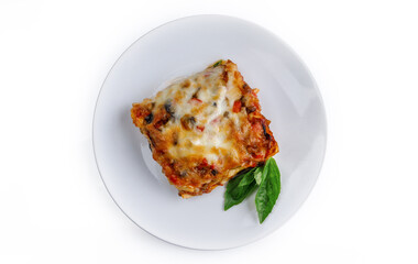 Portion of tasty lasagna, isolated on white