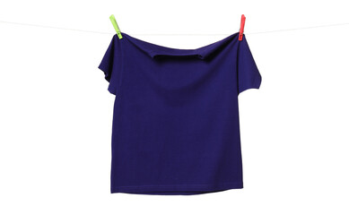 One purple t-shirt drying on washing line isolated on white
