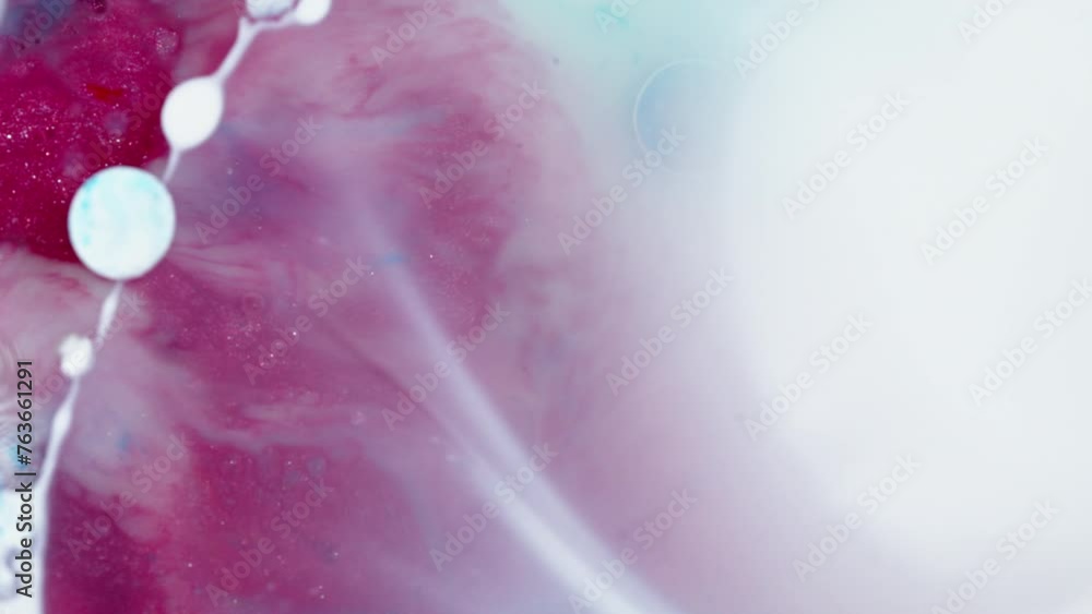 Poster abstract swirling mix of blue and magenta inks diffusing in water, creating an ethereal fluid art sc