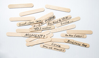 motivational messages for wellbeing motivational quotes, handwriting moving forward quotes on popsicle stick
