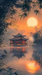 Fototapeten Scenic Sunset over the river with Asian traditional house and bamboo trees frame © Maizal