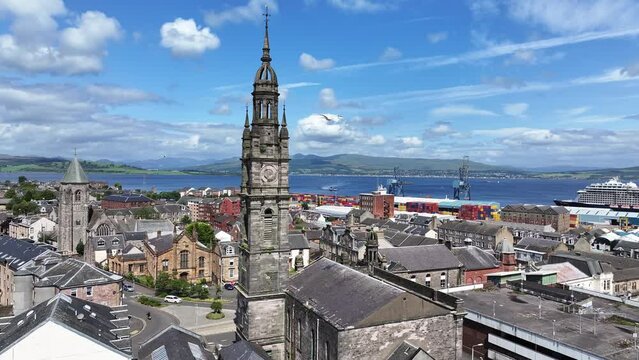 Aerial View, Church Towers and Cityscape of Greenock, Scotland UK on Sunny Day. Drone Shot