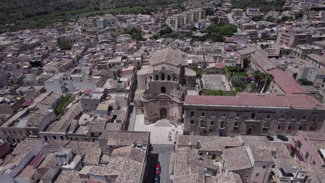 Aerial orbit historic concave facade Madonna Del Carmine, Noto Sicily