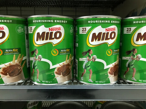 South Australia, Australia &ndash; March 20, 2024: Row of Milo cans from the Nestle food company displayed on supermarket shelf